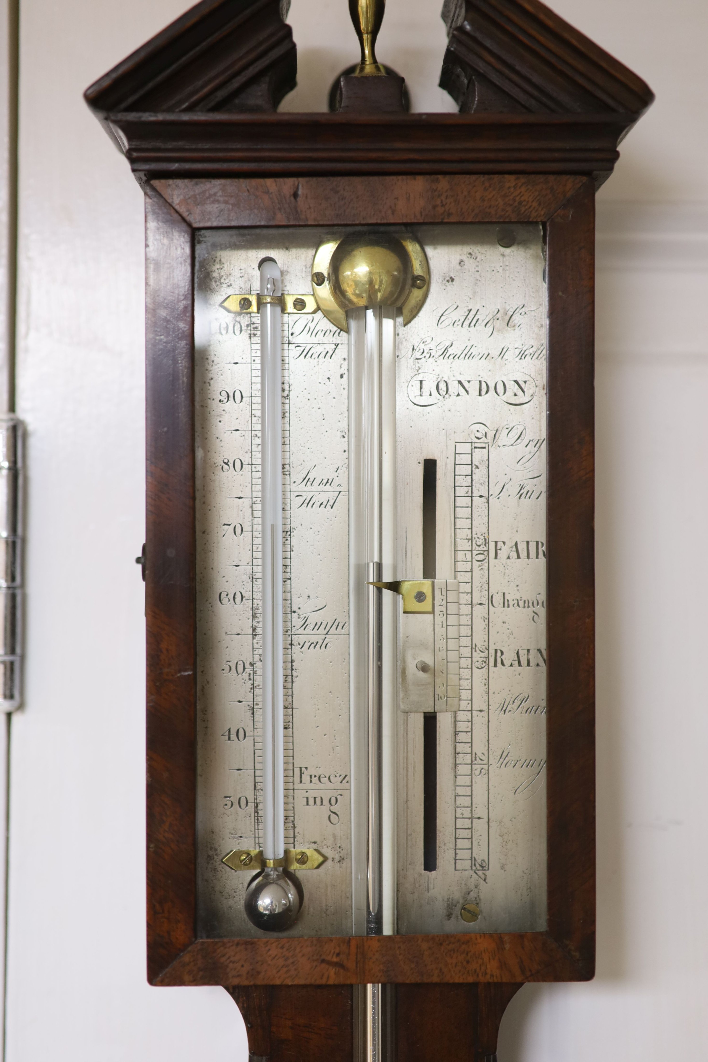 A George III mahogany stick barometer, by Cetti & Co. No. 25 Red Lion Street, Holborn, 38cm